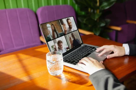 Man on table with laptop