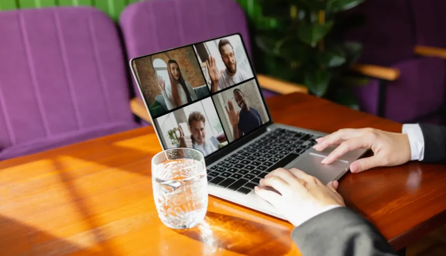 Man on table with laptop